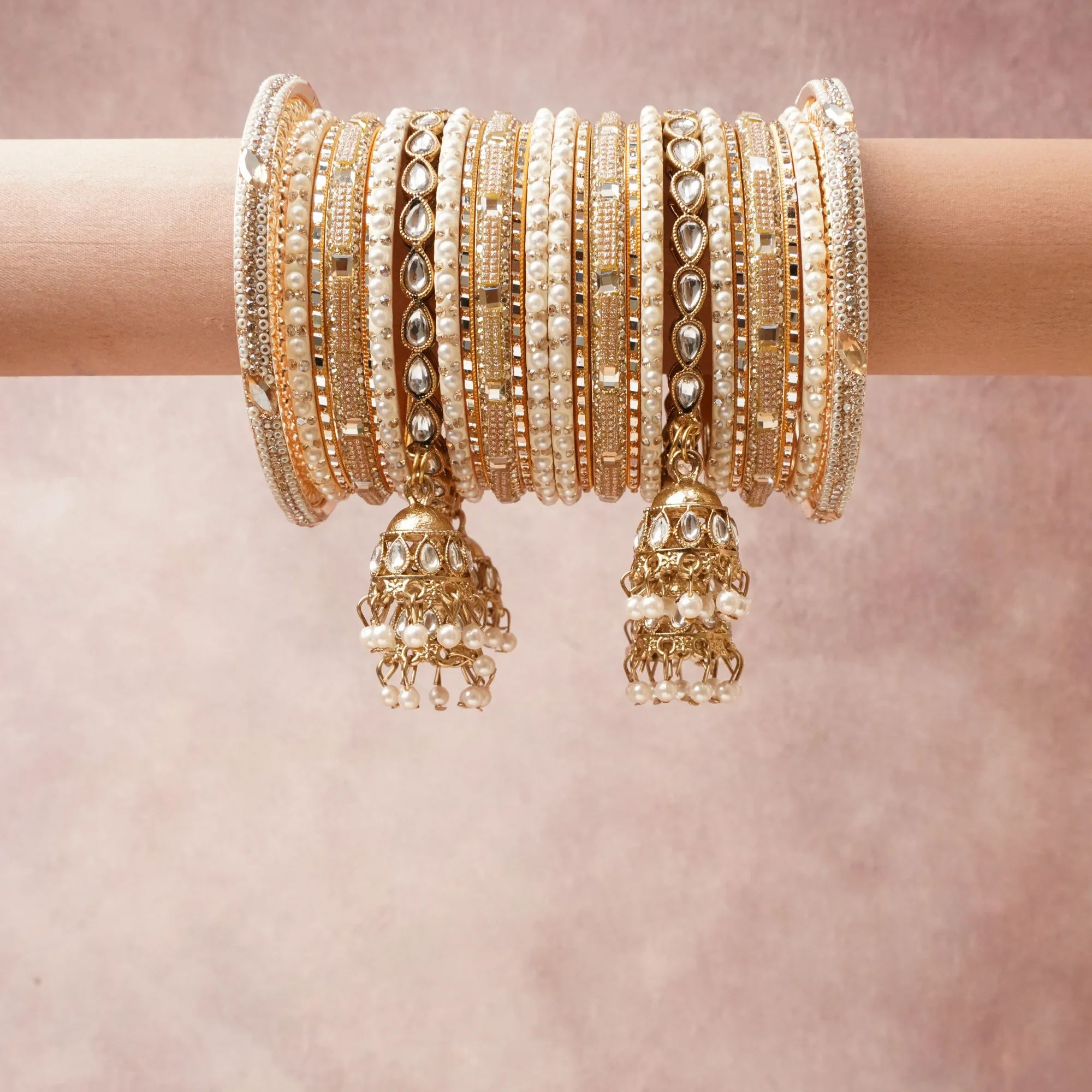 A majestic Gold set, complemented by Clear featuring Gold-toned Metal, Imitation Pearls, Clear Crystal, Enamel.
Rich, ceremonial, and designed to be passed through generations.